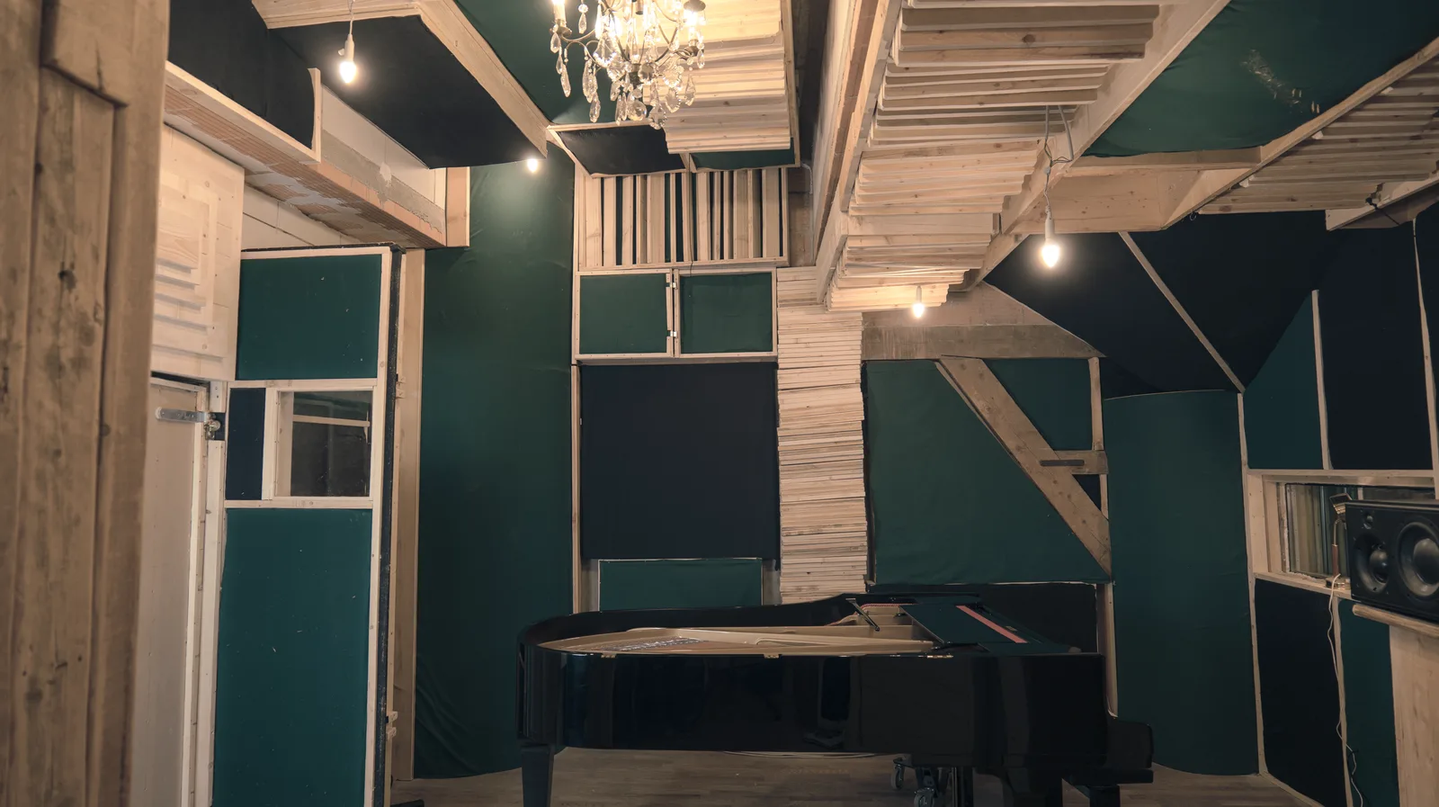 Grand piano wall in the Loumi recording studio